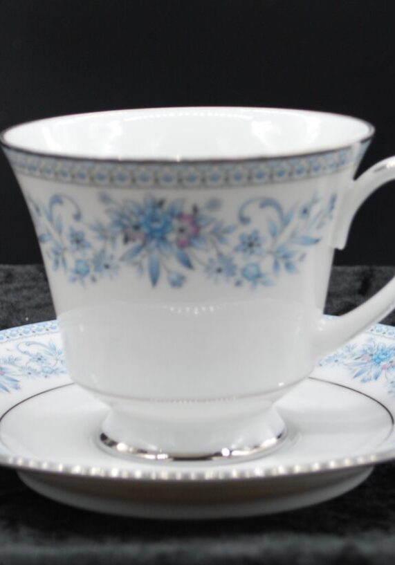Contemporary fine china by Noritake footed teacup and saucer Contemporary fine china by Noritake footed teacup and saucer